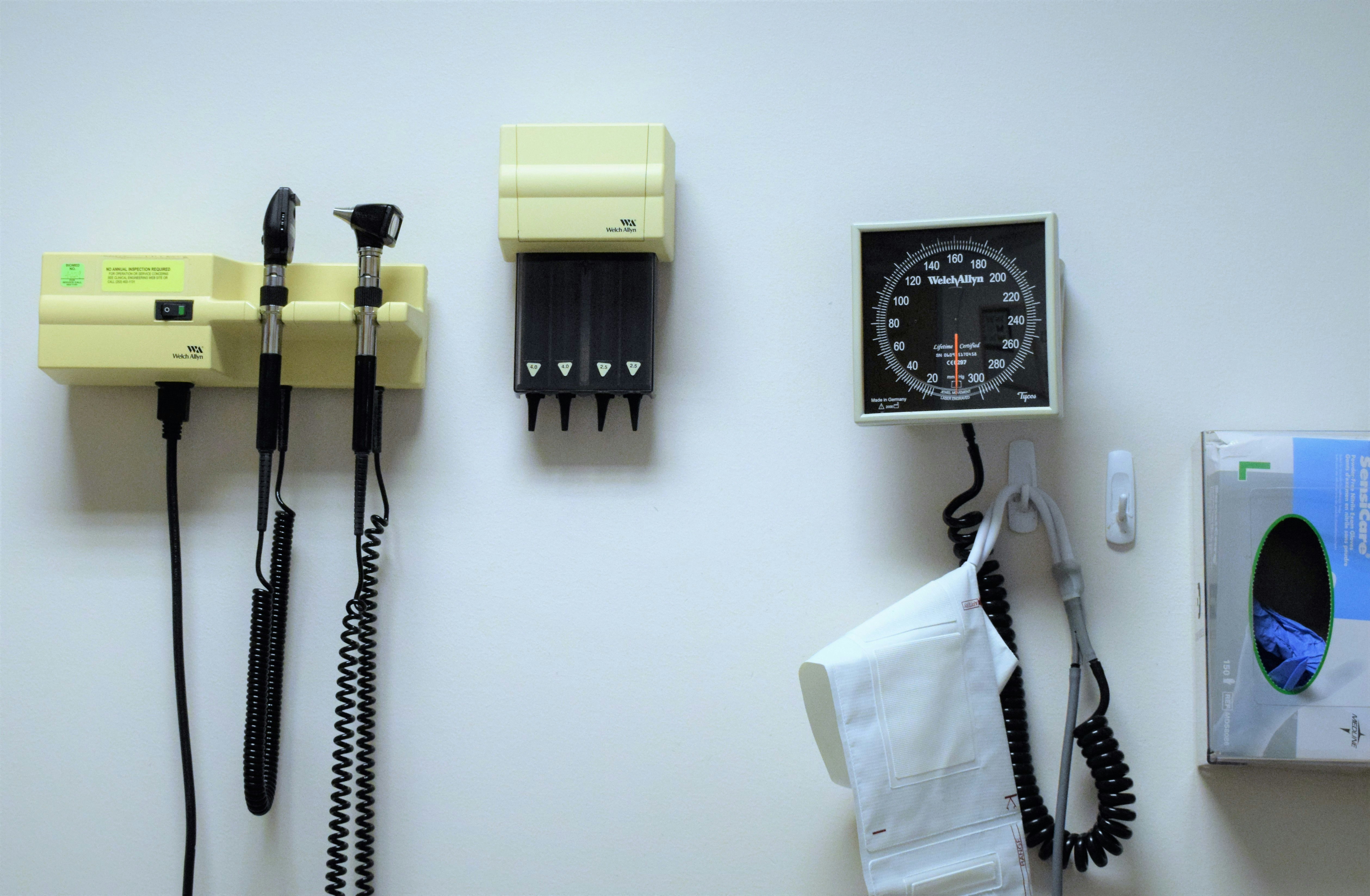 Healthcare professionals consulting with a patient